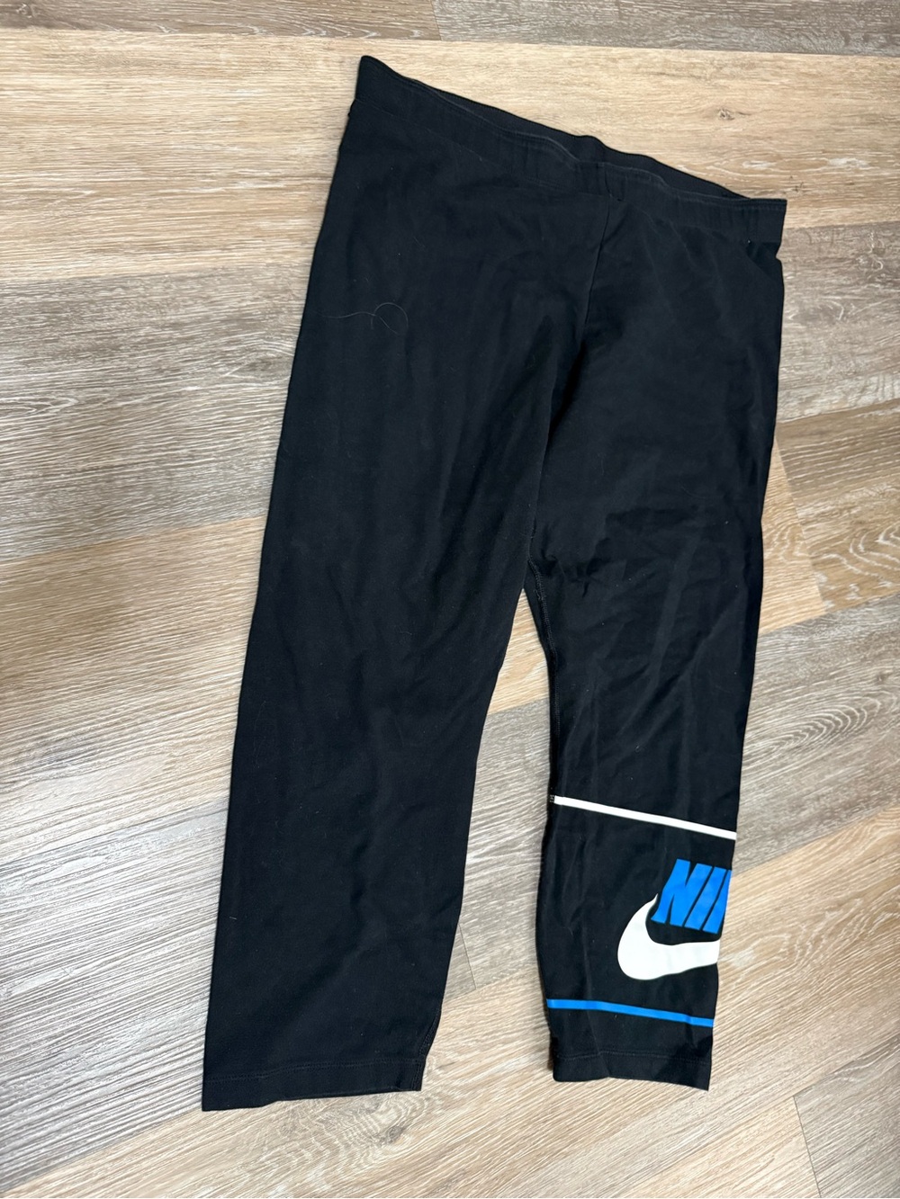Nike Black Leggings with Blue and White Swoosh Accent